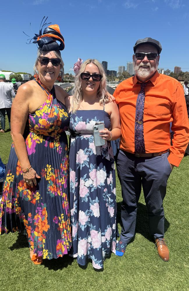 Jill, Amber and Paul Harrison at the Melbourne Cup at Flemington Racecourse on November 5, 2024. Picture: Phillippa Butt