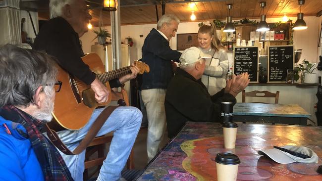 BOMBA Coffee House owner Beck Payne being sung happy birthday by her most-regular customers. Picture: Ian Torode