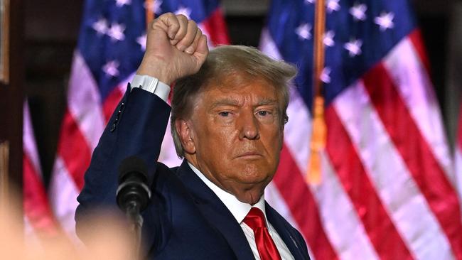 Former US president Donald Trump gestures to his supporters at Trump National Golf Club Bedminster in New Jersey on June 13, after his second indictment. Picture: AFP