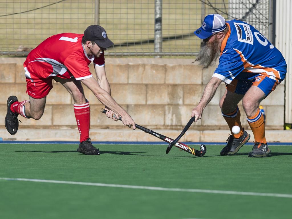 Red Lion White player Samuel Anderson (left) and Dennis O'Neill of Newtown in A4 men Presidents Cup hockey at Clyde Park, Saturday, May 27, 2023. Picture: Kevin Farmer