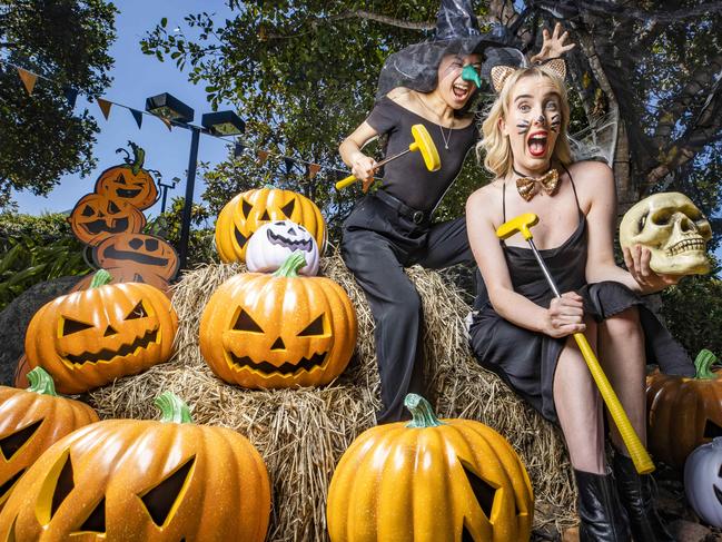 Alita Sokhara Says and Julia Crosswell get into the spirit at the Halloween-themed putt putt course at Victoria Park Golf Club. Picture Lachie Millard