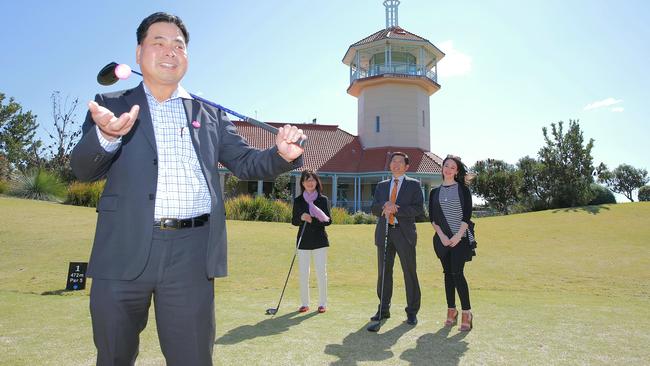 Alex Wu, in the foreground, at a golf event. Picture: News Corp Australia