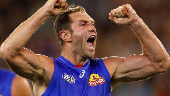 MELBOURNE, AUSTRALIA - MARCH 24: Travis Cloke of the Bulldogs celebrates his first goal against his former side during the 2017 AFL round 01 match between the Collingwood Magpies and the Western Bulldogs at the Melbourne Cricket Ground on March 24, 2017 in Melbourne, Australia. (Photo by Adam Trafford/AFL Media/Getty Images)