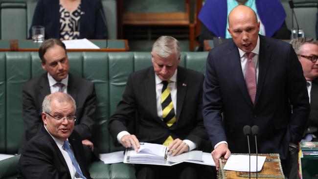 PM Scott Morrison and Home Affairs Minister Peter Dutton in Question Time in the House of Representatives chamber. Picture: Kym Smith