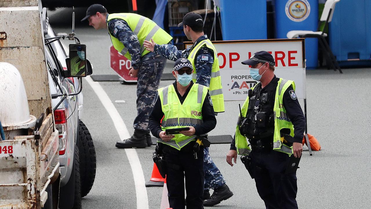 Police and the ADF at the Queensland border. Picture: Nigel Hallett