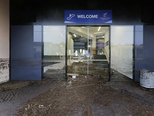 Flood damage at Channel Court shopping centre in Kingston. The automatic doors were washed off their tracks in the flooding. Picture: MATHEW FARRELL