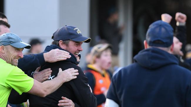 Whittlesea coach Jim Atkins' smile on the final siren as his team snaps an 11-game losing streak by beating Montmorency. Picture: Nathan McNeill.