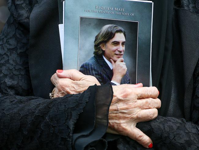 A mourner at Joe Acquaro’s funeral at Star of the Sea church in West Melbourne. Picture:Ian Currie