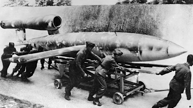 German soldiers rolling out a V-1 rocket bomb in 1944.