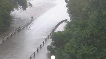 The flooded Seymour River covering the Bruce Highway between Ingham and Cardwell from earlier in the week, on Wednesday morning. Picture: Supplied