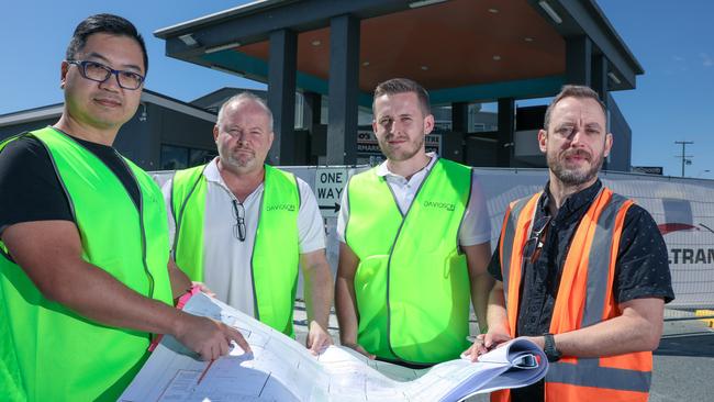 Exciting new plans have been unveiled for the future of Cocos shopping centre, Carrara. Alex Wang with Davidson Property’s Mike Ward and Kyle Davidson and HHH Architects director Nik Mitens. Picture: Glenn Campbell