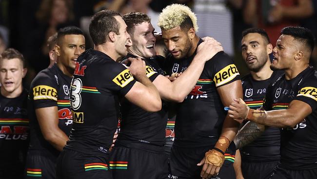 Viliame Kikau celebrates with Panthers teammates after full-time. Picture: Cameron Spencer/Getty Images