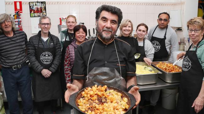 Azem Elmaz, owner of Shepparton’s Lutfiyes Shish Kebab, and his volunteers prepare food for emergency workers and people affected by the floods. Picture: David Crosling