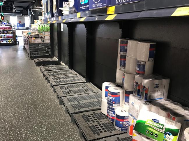 An Aldi cleared out of toilet paper. There were a few paper towels but no toilet paper.