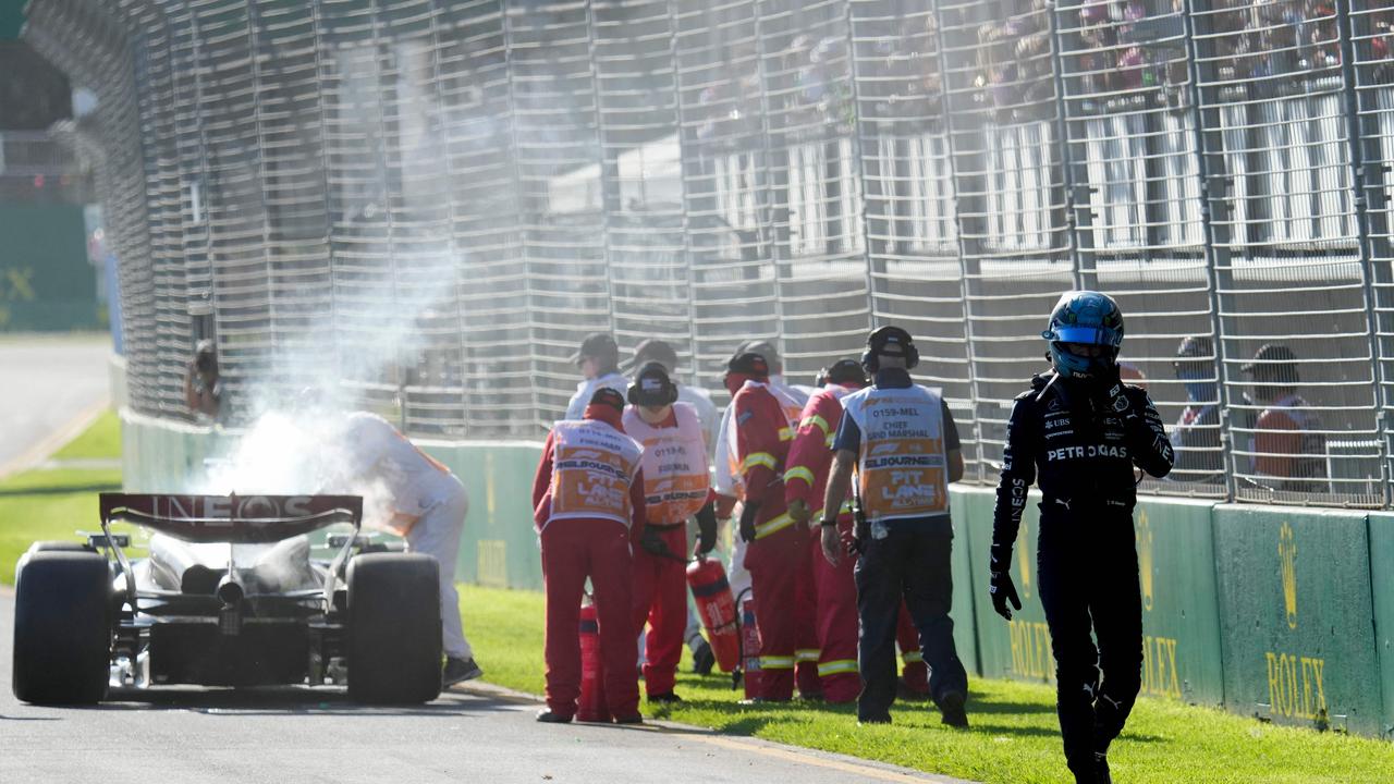 Mercedes' British driver George Russell has the lonely walk back. Photo by Simon Baker / POOL / AFP.