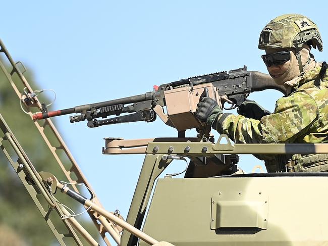 An Australian soldier from 3 CSSB (Combat Service Support Battalion) keeps watch during a resupply mission as part of 'Talisman Sabre. Picture: Getty