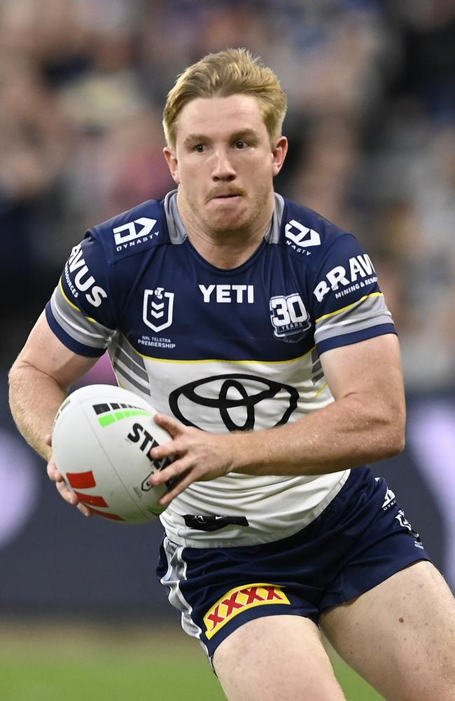 Tom Dearden of the Cowboys runs the ball during the round eleven NRL match between Cowboys and Sea Eagles at Queensland Country Bank Stadium, on May 17, 2025, in Townsville, Australia. (Photo by Ian Hitchcock/Getty Images)