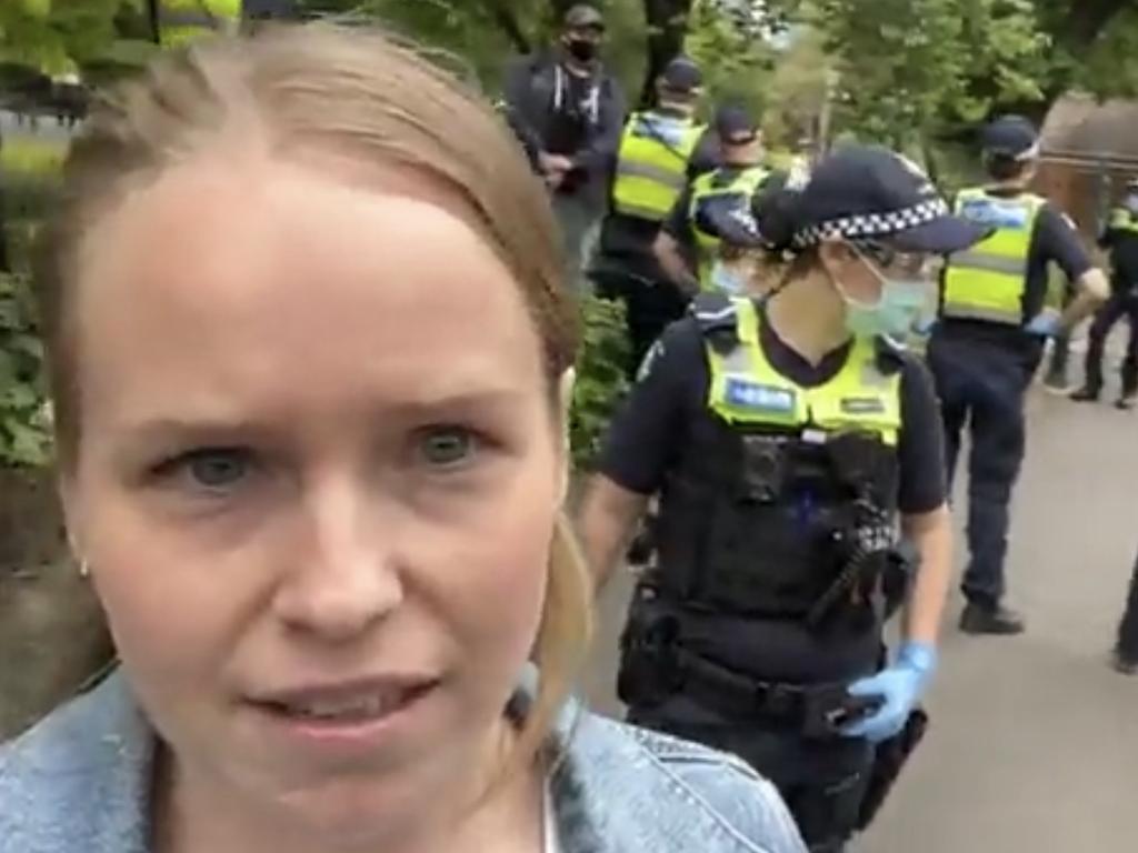 Ms Smit with police before she was arrested in December 2020. Picture: Supplied