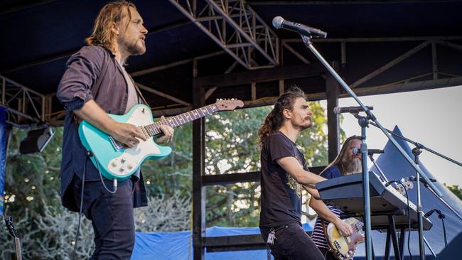 Thirsty Merc frontman and pianist Rai Thistlethwayte (centre), lead guitarist Matt Smith (left) and bass guitarist Phil Stack (right) at the G and S Engineering Wine and Food Day in Queens Park, Mackay, Saturday, July 17, 2021. Picture: Heidi Petith