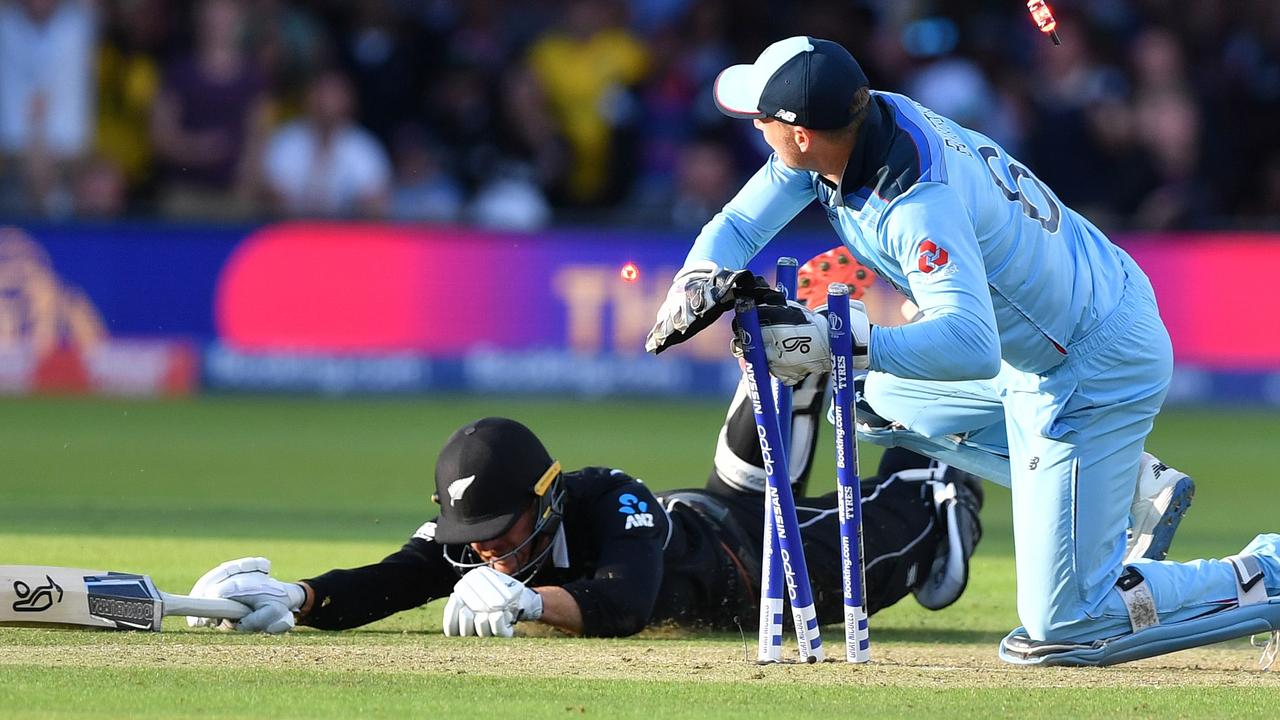 Jos Buttler runs out Martin Guptill to win England the World Cup.