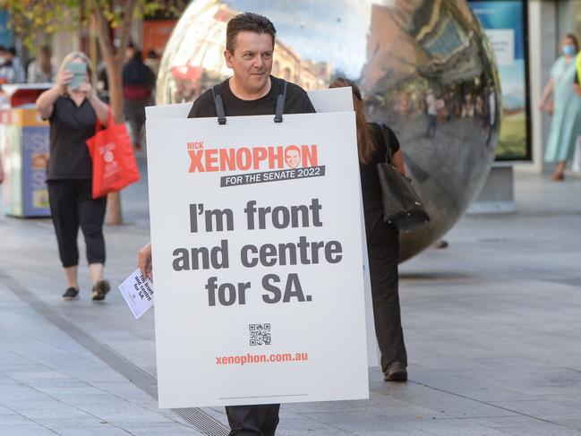 MARCH 27, 2022: Nick Xenophon handing out election pamphlets in Rundle Mall to drum up support for his latest federal Senate bid. Picture: Brenton Edwards