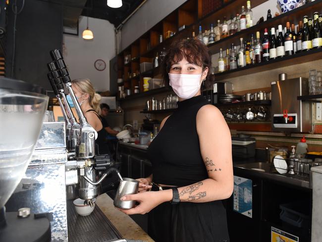 Customers have been allowed to do away with masks, while retailers and hospitality staff still have to wear them. Picture: Josie Hayden