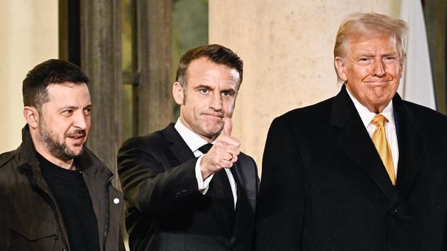 Ukrainian President Volodymyr Zelensky, left, French President Emmanuel Macron and US president-elect Donald Trump in Paris in December. Picture: AFP