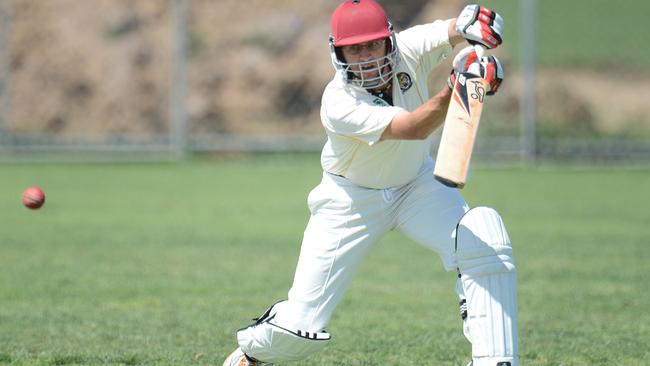 Corey Hand square drives for Seaford Tigers.