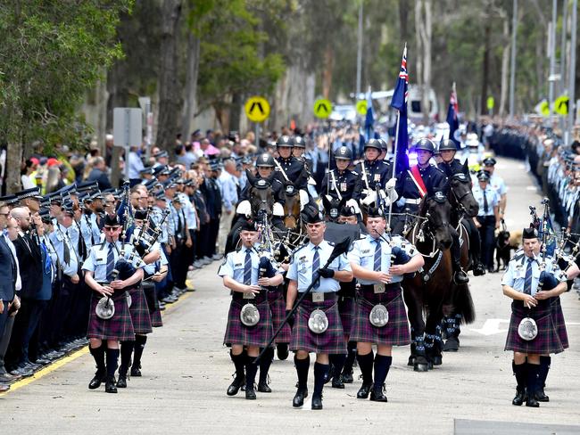 The funeral procession at the memorial service with full police honours for constables Rachel McCrow and Matthew Arnold at Brisbane Entertainment Centre. Picture: John Gass/NCA NewsWire