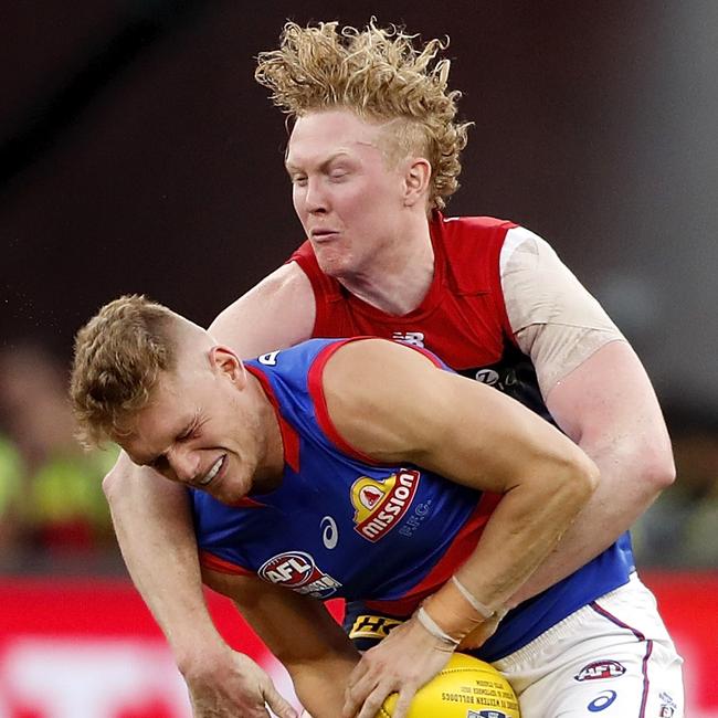 Adam Treloar of the Bulldogs is tackled by Clayton Oliver of the Demons during the 2021 Grand Final. (Photo by Dylan Burns/AFL Photos via Getty Images)