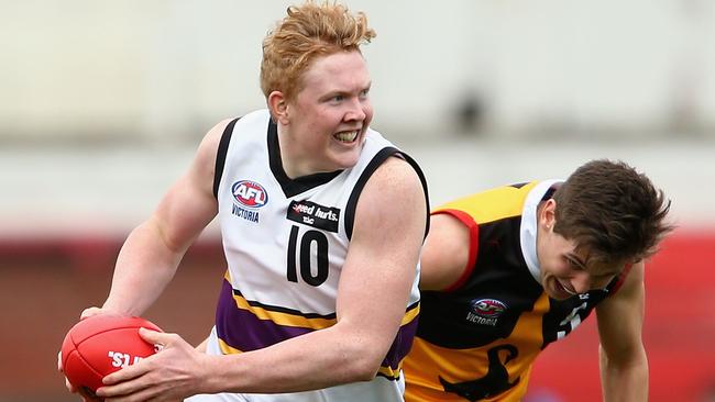 MELBOURNE, AUSTRALIA - SEPTEMBER 06: Clayton Oliver of Murray runs during the TAC Cup Qualifying Final match between the Dandenong Stingrays and the Murray Bushrangers at Ikon Park on September 6, 2015 in Melbourne, Australia. (Photo by Robert Prezioso/AFL Media/Getty Images)