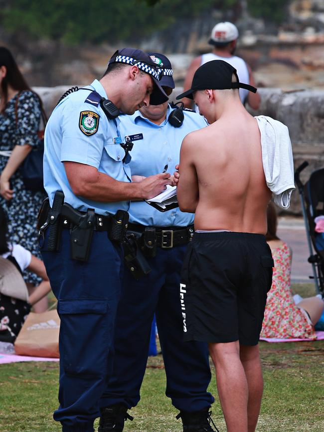 Police have the power to enforce actions such as instructing drinkers to pour out their alcohol, give verbal warnings and issue fines. Picture: Adam Yip