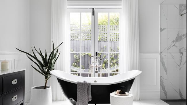 Dreaming of bubble baths in this freestanding tub.