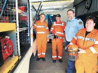 SES volunteers (from left) Ken Hudson, John Ludlow, Stuart Ferguson, and Tania Pollard hope more volunteers will answer the call to join them. . Picture: CATHY ADAMS