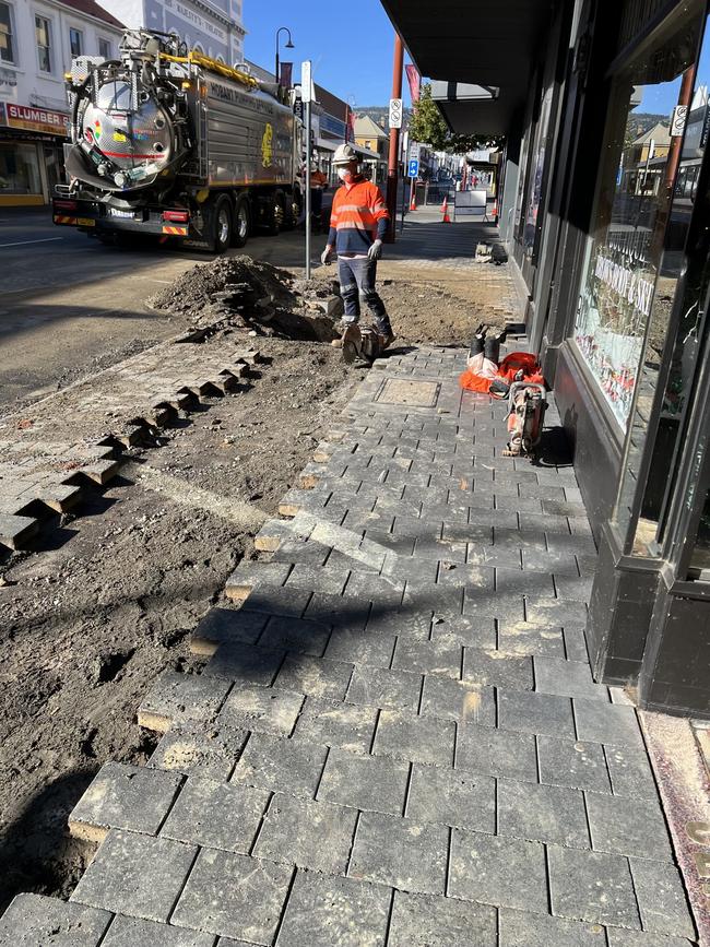 Work to repair the burst water main outside Liverpool Street business Boutique Brows Body &amp; Skin. Picture: supplied.