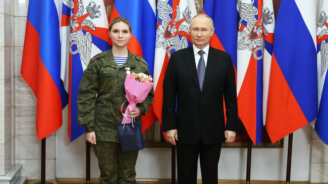 Russian President Vladimir Putin poses during an official military ceremony to award Russian servicemen and women involved in Russia's invasion in Ukraine. Picture: Mikhail Klimentyev/Sputnik/AFP