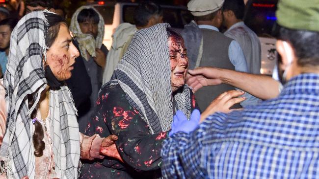 Wounded women arrive at a Kabul hospital for treatment. Picture: AFP