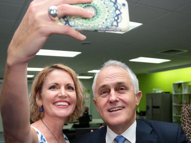 Prime Minister Malcolm Turnbull poses for a selfie during a tour of the innovation hub The SPACE on June 22, 2016 in Darwin, Australia. The Coalition party’s $30 million jobs and investment package for Cairns will be divided into two parts, with $10 million for an Innovation Centre and $20 million allocated to promote local jobs and investment in Cairns. (Photo by Stefan Postles/Getty Images)