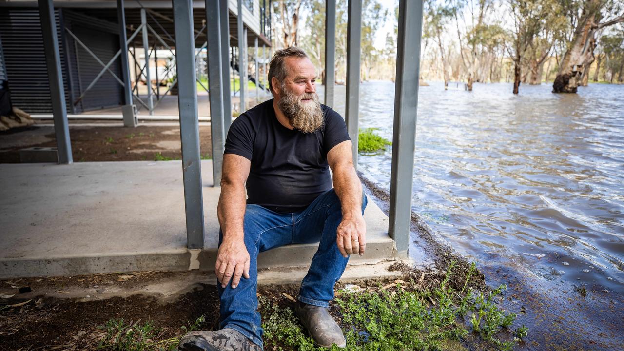 Brenden Spicer watches water lap at his holiday home. Picture: Tom Huntley