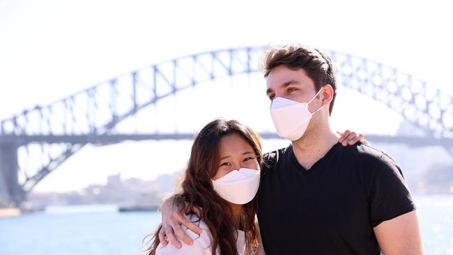 New health advice across the state encourages residents to ‘consider’ wearing masks where they cannot socially distance. Picture: NCA NewsWire / Dylan K Cover