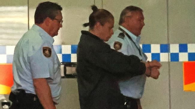 Corey London is pictured in custody at Burwood Local Court. London refused to testify, after initially telling police Melissa Goodwin had given him oral sex in a prison storeroom.