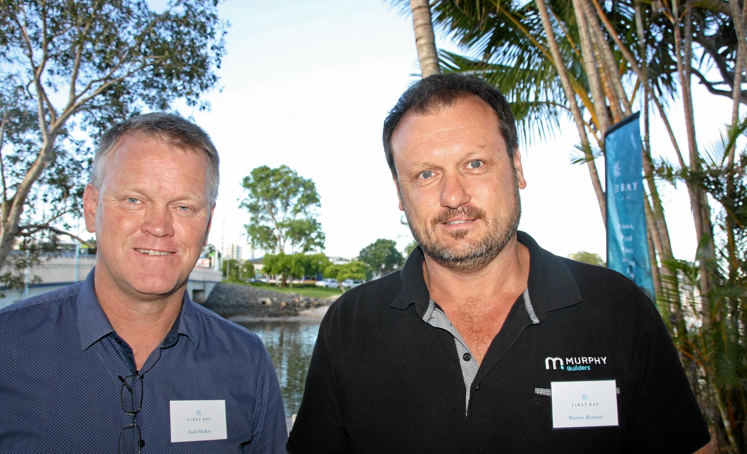 Todd McKee of McGrath Estate Agents and Werner Reiterer of Murphy Builders at Mooloolaba to celebrate the launch of the luxury First Bay Coolum development. Picture: Erle Levey