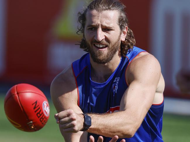 NCA. MELBOURNE, AUSTRALIA. 5th March, 2025 . Western Bulldogs training at Whitten Oval .   Bulldog Marcus Bontempelli takes it easy after injuring his calf during the practise match against Hawthorn   .  Picture: Michael Klein