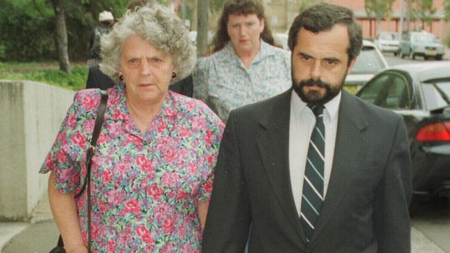 Wayne De Gruchy (right) leaving Wollongong Court after giving evidence in the committal hearing of his son Matthew, accused of murdering his mother, brother and sister at their Albion Park home in 1996.