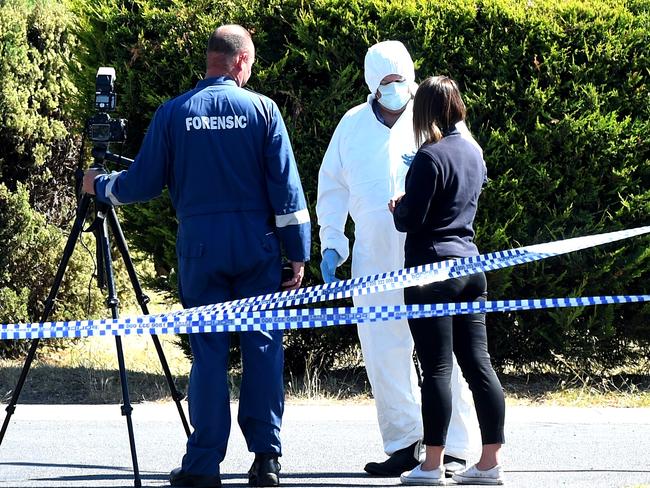 Police outside the house in Meadow Heights. Picture: Nicole Garmston