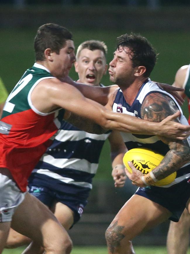 South Cairns’ Shaun Ayling and Port Douglas’ Jesse Mawson. PICTURE: ANNA ROGERS.