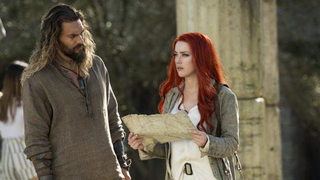 Arthur Curry played by Jason Momoa and Mera (Amber Heard) in a scene from Aquaman.