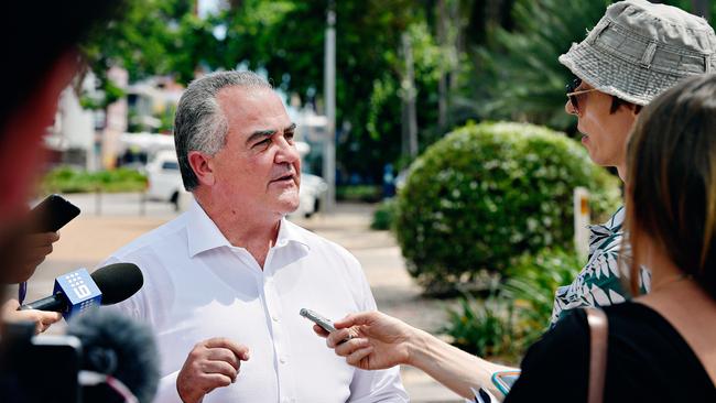 Minister for Housing and Community Development Gerry McCarthy speaks to media about the town camp review outside Parliament House in 2018.