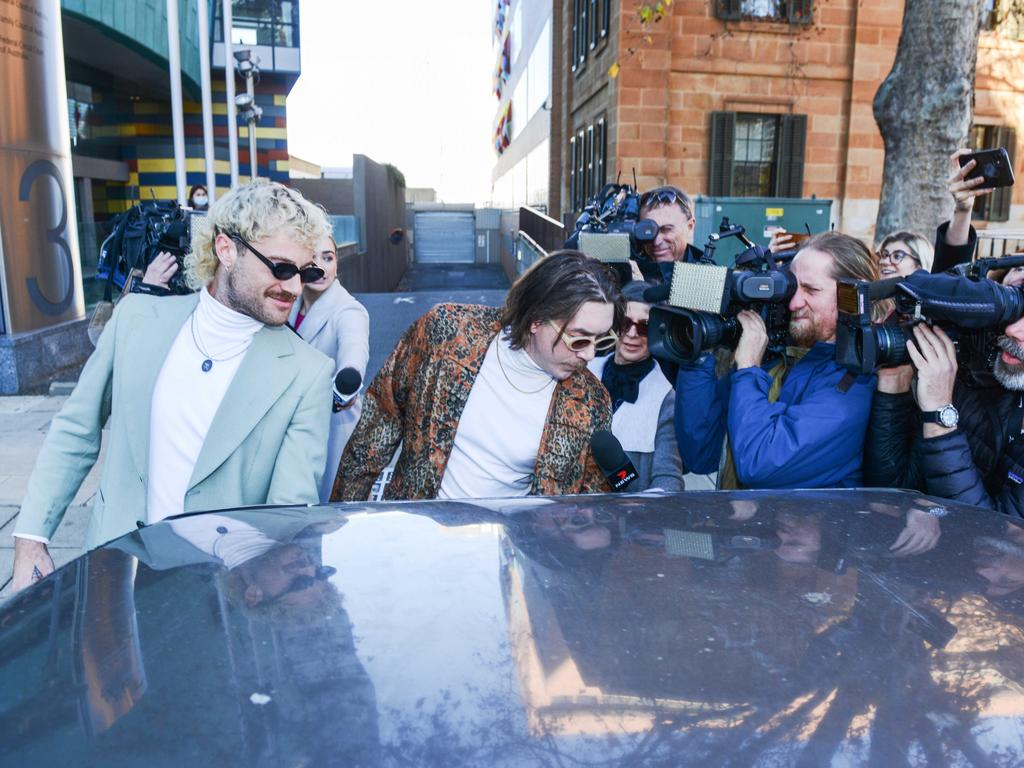 The two men put on a show for reporters outside of the Adelaide Magistrates Court following their first court appearance in June last year. Picture: Brenton Edwards