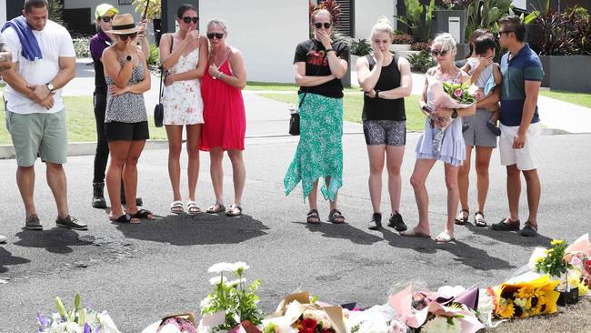 People pay respects to Hannah Clarke and her three children at Raven Street where they were set alight and murdered by Rowan Baxter on the way to school. Photographer: Liam Kidston